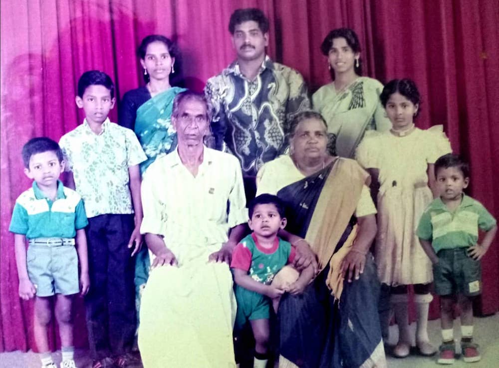 Pannir Selvam (leftmost in blue and white shirt) is seen here in a family photo when he was young. — Picture courtesy of Pannir Selvam’s family