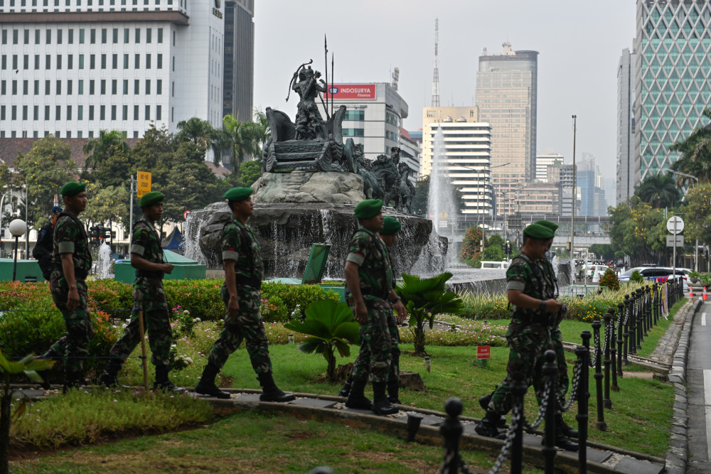 Indonesian soldiers patrol near the constitutional court in Jakarta June 14, 2019, as the court hears a defeated presidential challengeru00e2u20acu2122s claim that Indonesiau00e2u20acu2122s 2019 election was rigged, allegations that spawned deadly rioting last month. u00e2u20acu201d AFP pic