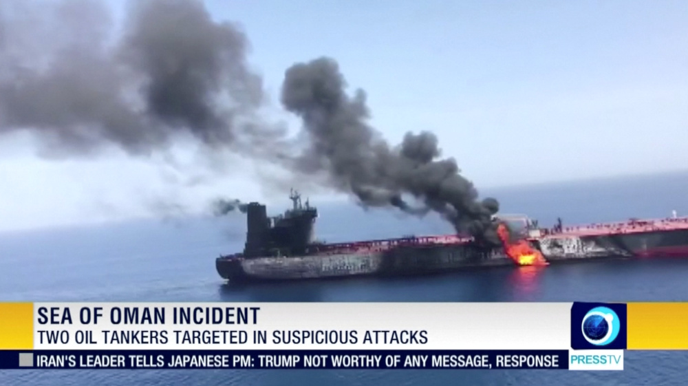 Still image taken from a video appears to show two tankers at sea, one of which has a large plume of dark smoke in the Gulf of Oman. u00e2u20acu201d Press TV/IRIB handout pic via Reuters 