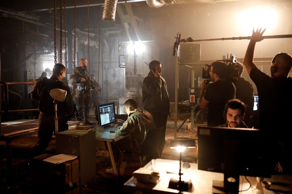 Actors and filming crew members work on the set of Israeli television series u00e2u20acu02dcFaudau00e2u20acu2122 in Tel Aviv, Israel May 30, 2019. u00e2u20acu201d Reuters pic          