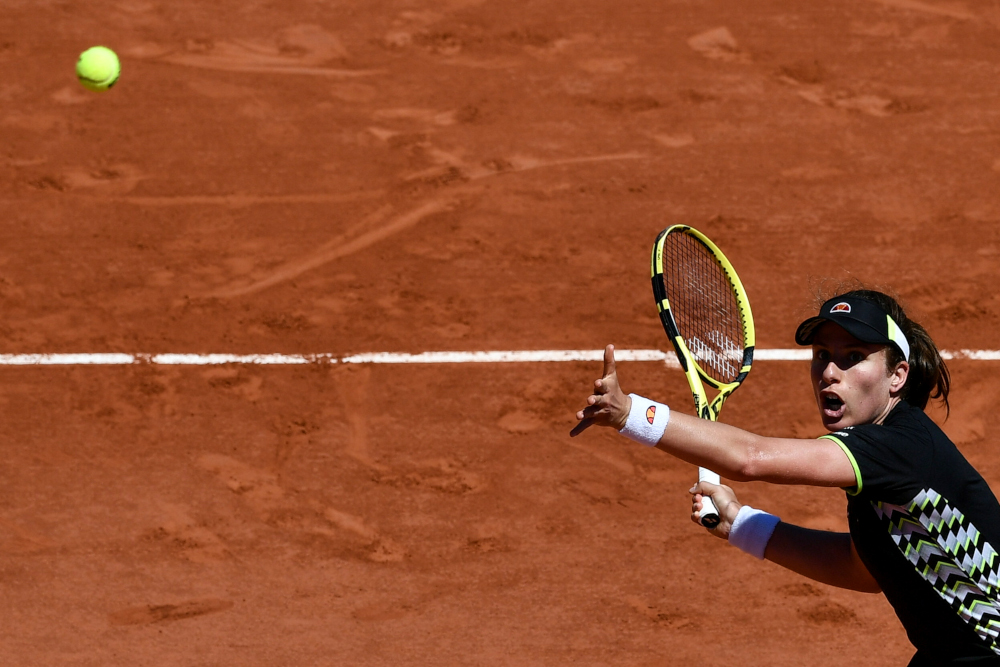 Britainu00e2u20acu2122s Johanna Konta returns the ball to Croatiau00e2u20acu2122s Donna Vekic during their womenu00e2u20acu2122s singles fourth round match on day eight of The Roland Garros 2019 French Open tennis tournament in Paris June 2, 2019. u00e2u20acu201d AFP pic