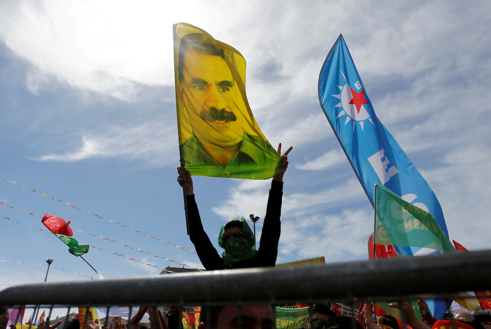 File photo of a  man holding a flag with a picture of imprisoned Kurdish rebel leader Abdullah Ocalan during a gathering to celebrate Newroz, in Istanbul, Turkey March 21, 2018. u00e2u20acu201d Reuters picnnn