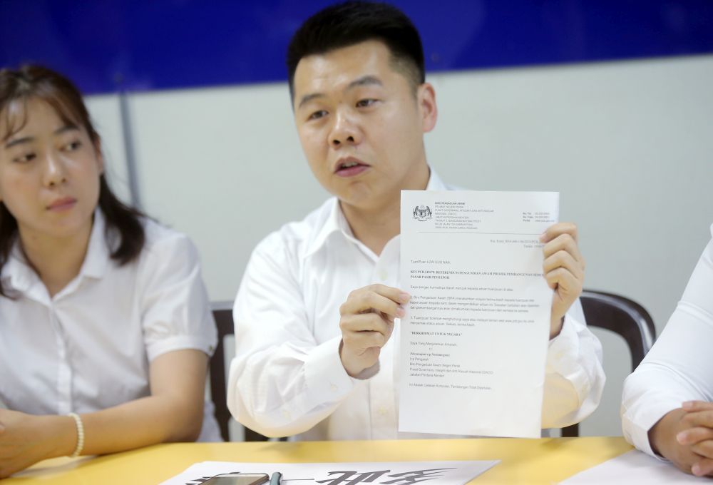 Perak MCAu00e2u20acu2122s Low Guo Nan speaks to reporters during a press conference in Ipoh June 21, 2019. u00e2u20acu201d Picture by Farhan Naijb