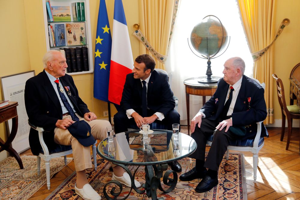 French President Emmanuel Macron meets two French WWII veterans Leon Gautier (right) and Jacques Lewis in Bayeux, France, June 6, 2019 as part of the ceremonies of the 75th anniversary of the D-Day landings. u00e2u20acu201d Reuters pic