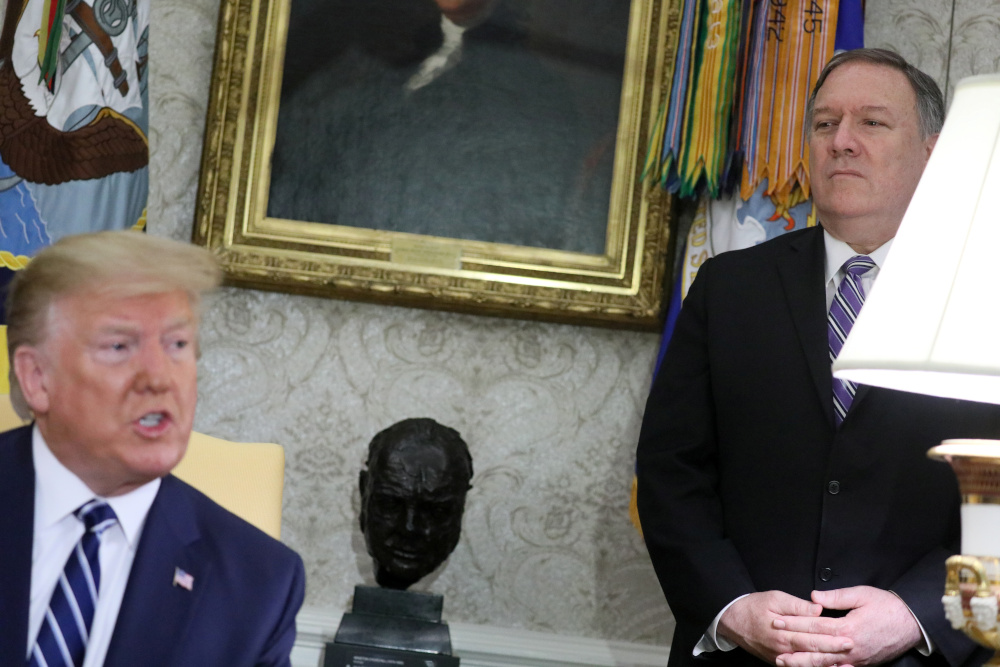 US Secretary of State Mike Pompeo looks on as US President Donald Trump speaks during a meeting with Canadau00e2u20acu2122s Prime Minister Justin Trudeau in the Oval Office of the White House in Washington, June 20, 2019. u00e2u20acu201d Reuters pic
