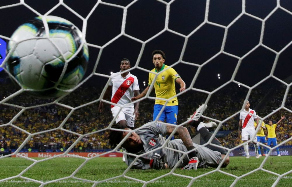 Brazil's Marquinhos celebrates their fifth goal against Peru. u00e2u20acu201d Reuters pic