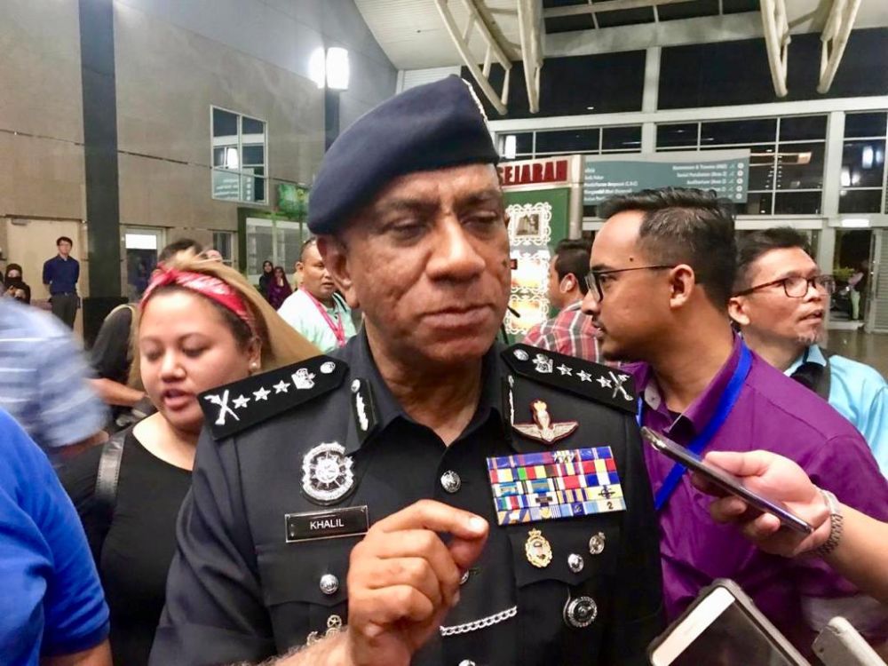 Johor police chief Datuk Mohd Khalil Kader Mohd cautioned the public against purchasing contraband liquor. u00e2u20acu201d Picture by Ben Tann