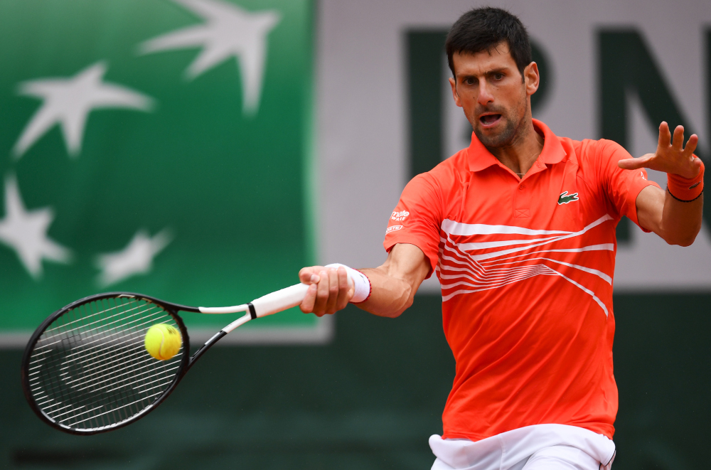 Serbiau00e2u20acu2122s Novak Djokovic returns the ball to Germanyu00e2u20acu2122s Jan-Lennard Struff during their menu00e2u20acu2122s singles fourth round match on day nine of The Roland Garros 2019 French Open tennis tournament in Paris June 3, 2019. u00e2u20acu201d AFP pic