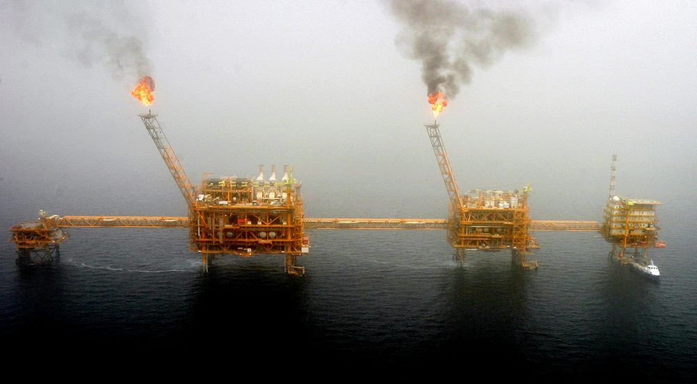 Gas flares from an oil production platform at the Soroush oil fields in the Persian Gulf, south of the capital Tehran, July 25, 2005. u00e2u20acu201d Reuters pic