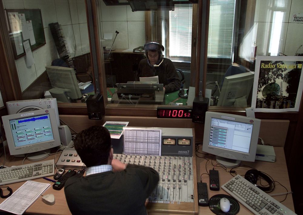 A Vatican Radio reporter speaks during a live programme on April 10, 2001. u00e2u20acu201d Reuters pic