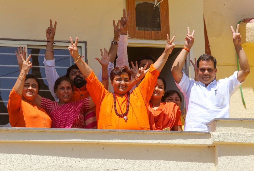 Indian Bharatiya Janata Party (BJP) candidate Pragya Singh Thakur, known as Sadhvi Pragya, gestures along with other BPJ supporters on the day of the vote results for Indiau00e2u20acu2122s general election at her residence in Bhopal. u00e2u20acu201d AFP pic
