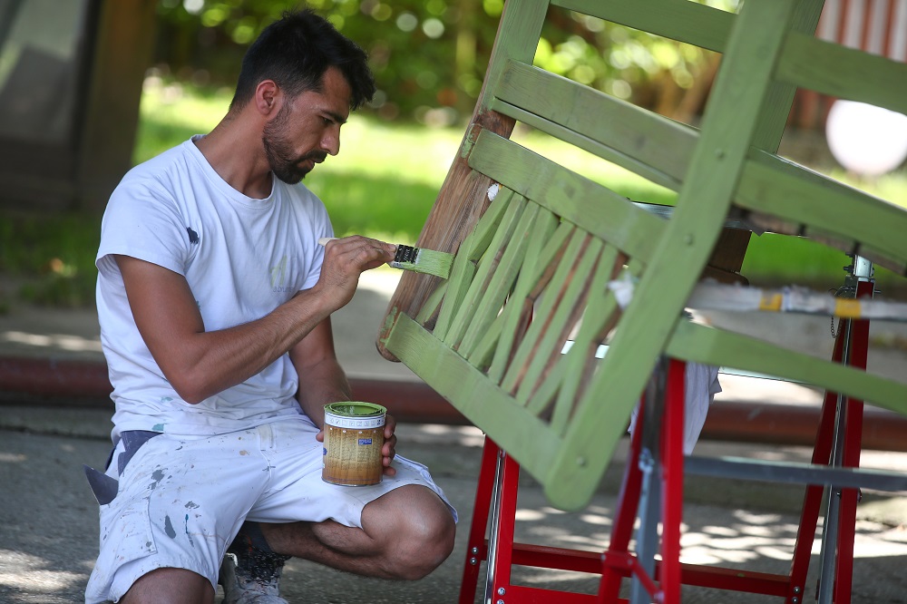 Painter apprentice Yar Mohammad Haiqar from Afghanistan works in Hausen near Regensburg, Germany June 18, 2019. u00e2u20acu201d Reuters pic        