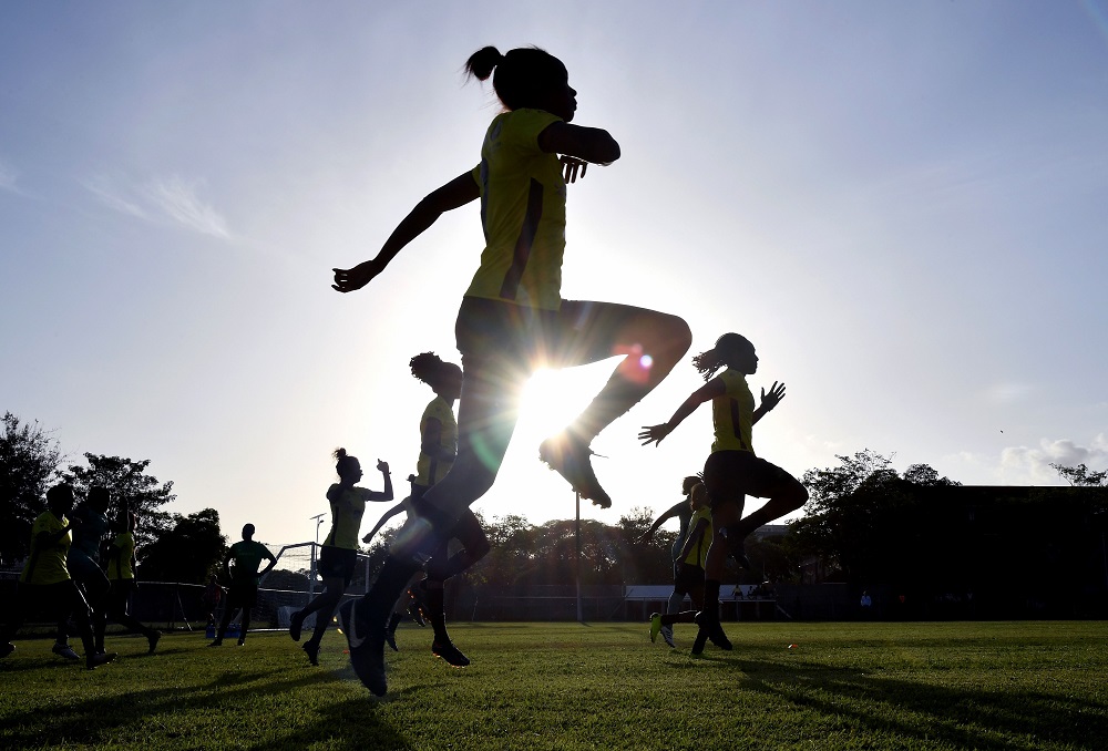 Members of Jamaicau00e2u20acu2122s womenu00e2u20acu2122s national football team, nicknamed u00e2u20acu02dcReggae Girlzu00e2u20acu2122, take part in a training session at St Georges College in Kingston, Jamaica May 17, 2019. u00e2u20acu201d AFP pic   