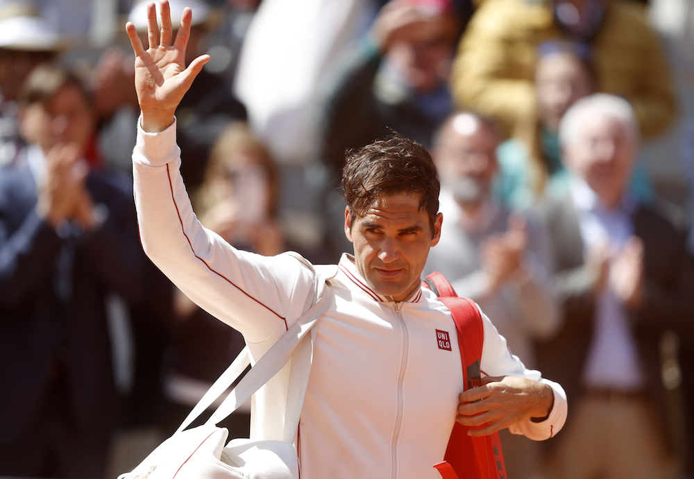 Switzerlandu00e2u20acu2122s Roger Federer greets the crowd after losing his semifinal match against Spainu00e2u20acu2122s Rafael Nadal at Roland Garros in Paris on June 7, 2019. u00e2u20acu201d Reuters picnn