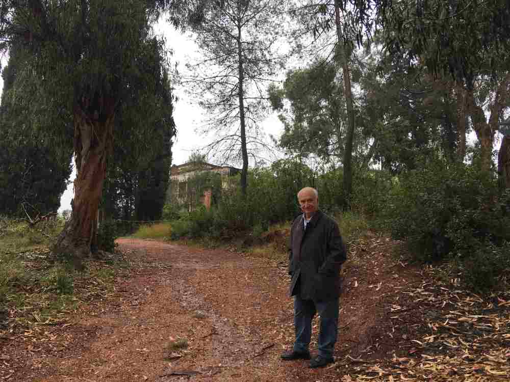 Pablo Nuno, a 78-year old entrepreneur, stands in front of his former property, a 12th Century farmhouse in the countryside north of Barcelona, May 3, 2019. u00e2u20acu2022 Picture via Thomson Reuters Foundation/Sophie Davies