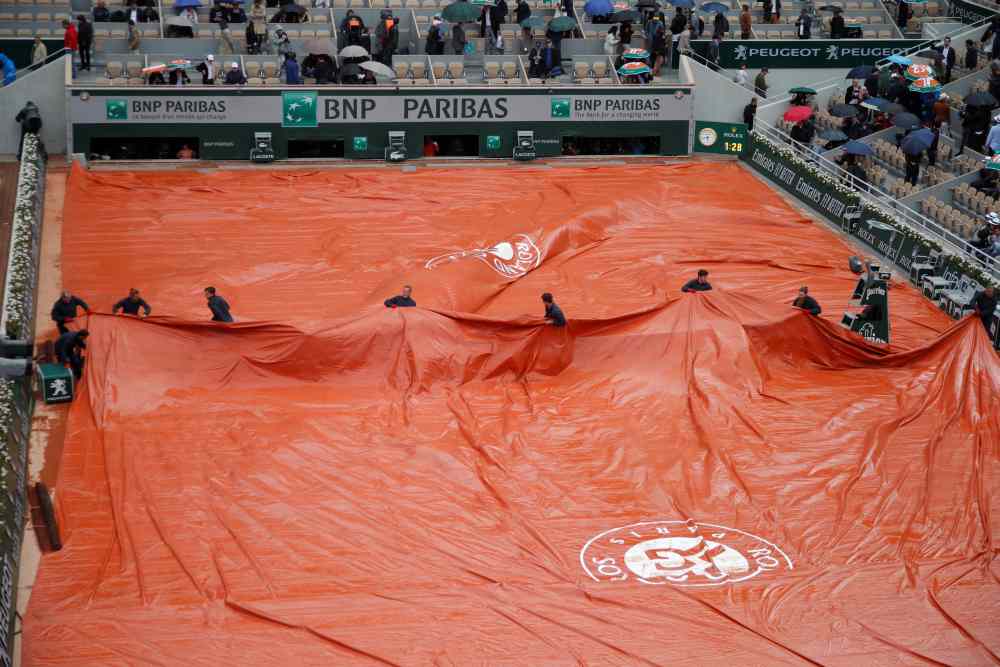 A general view of the court as the match between Serbia's Novak Djokovic and Austria's Dominic Thiem is suspended due to rain, June 7, 2019. u00e2u20acu2022 Reuters pic 