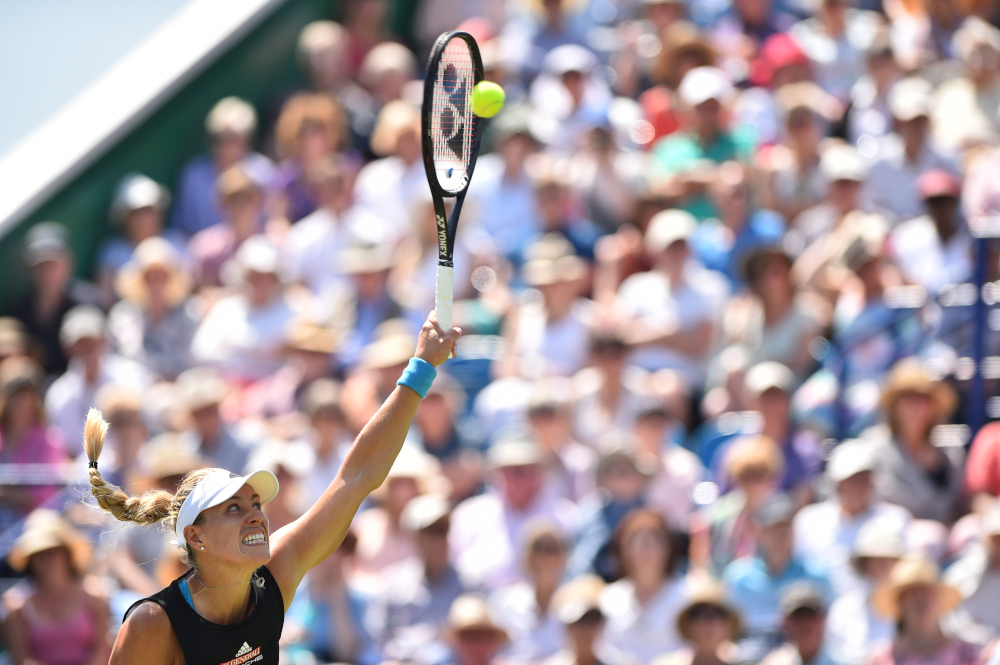 Germanyu00e2u20acu2122s Angelique Kerber serves to Romaniau00e2u20acu2122s Simona Halep during their womenu00e2u20acu2122s singles quarter-final match at the WTA Nature Valley International tennis tournament in Eastbourne, southern England June 27, 2019. u00e2u20acu201d AFP pic