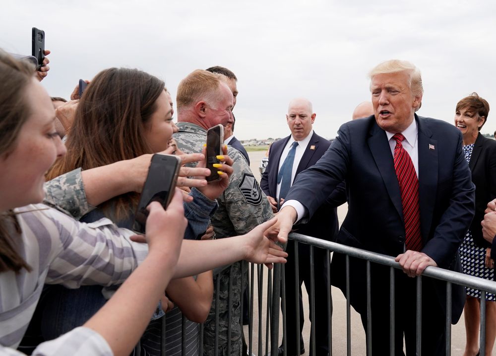 US President Donald Trump greets well-wishers after arriving at Des Moines International Airport, en route to a campaign fundraising dinner in Des Moines, Iowa, US, June 11, 2019. u00e2u20acu201d Reuters pic