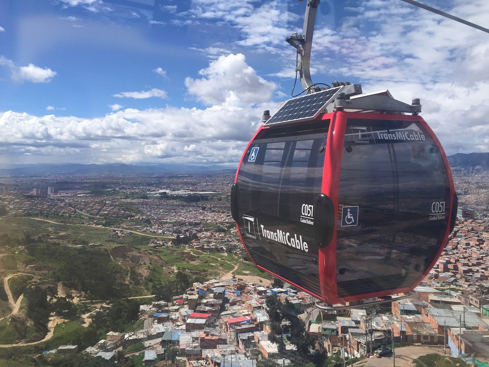 A cable car of the solar-powered TransMicable system runs above Ciudad Bolivar in Bogota, Colombia June 5, 2019. u00e2u20acu201d Thomson Reuters Foundation pic