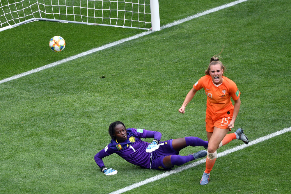 Netherlandsu00e2u20acu2122 midfielder Jill Roord celebrates her teamu00e2u20acu2122s third goal next to Cameroonu00e2u20acu2122s goalkeeper Annette Ngo Ndom during the France 2019 Womenu00e2u20acu2122s World Cup Group E match June 15, 2019, in Valenciennes, France. u00e2u20acu201d AFP pic