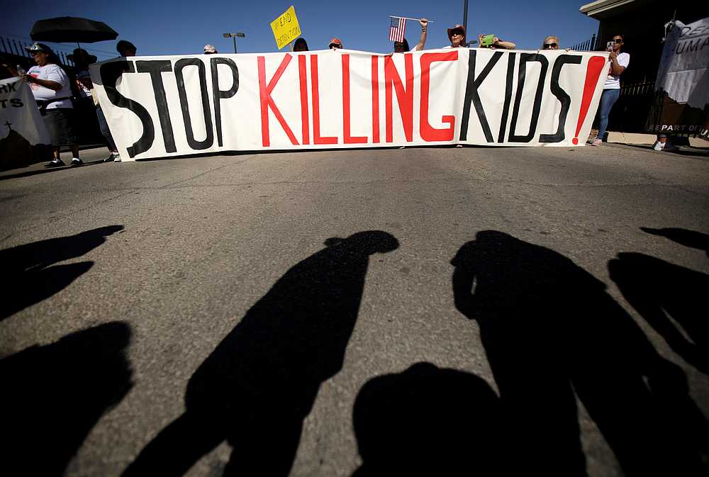 Activists take part in a protest to demand justice for the death of migrant children, outside the US Border Patrol custody in El Paso, Texas May 25, 2019. u00e2u20acu201d Reuters pic