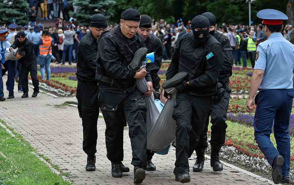 Police officers detain an opposition supporter during a protest against presidential election, in Almaty, Kazakhstan June 9, 2019. u00e2u20acu201d Reuters pic