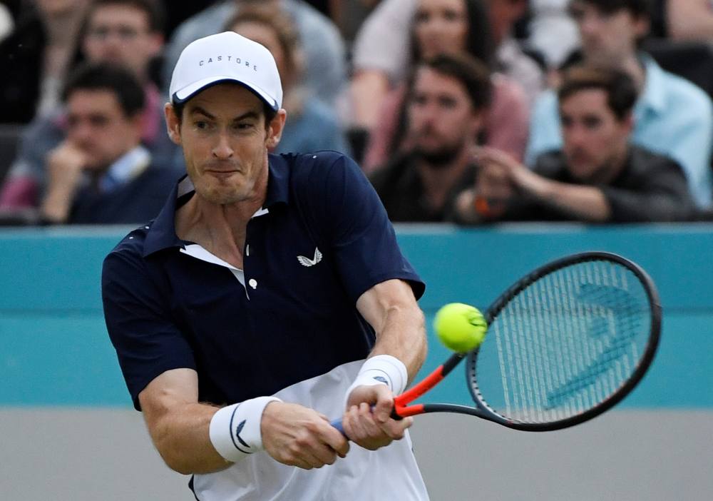Britain's Andy Murray in action during his quarter final doubles match against Britain's Dan Evans and Ken Skupski in London June 21, 2019. u00e2u20acu2022 Reuters pic