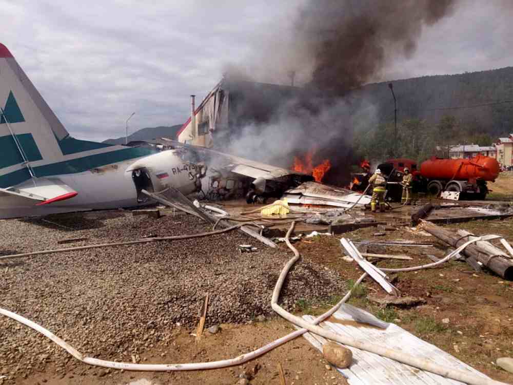 An Antonov An-24 passenger plane is seen on fire after an emergency landing in the town of Nizhneangarsk, Russia June 27, 2019. u00e2u20acu201d Russian Emergencies Ministry handout via Reuters