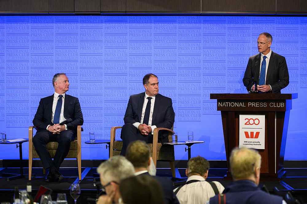News Corp executive chairman Michael Miller (right) speaks while ABC managing director David Anderson (centre) and Nine CEO Hugh Marks look on in Canberra, Australia, June 26, 2019. u00e2u20acu201d AAP Image/Rohan Thomson via Reuters