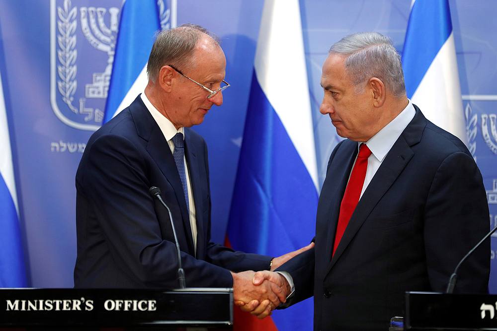 Israeli Prime Minister Benjamin Netanyahu (right) shakes hands with Nikolai Patrushev, secretary of the Russian Security Council, as they deliver statements during their meeting in Jerusalem June 24, 2019. u00e2u20acu201d Reuters pic