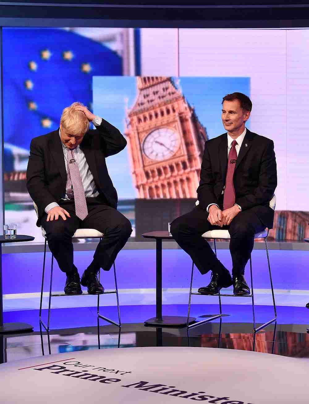 Boris Johnson (left) and Jeremy Hunt appear on BBC TV's debate with candidates vying to replace British PM Theresa May, in London June 18, 2019. u00e2u20acu201d Jeff Overs/BBC handout via Reuters