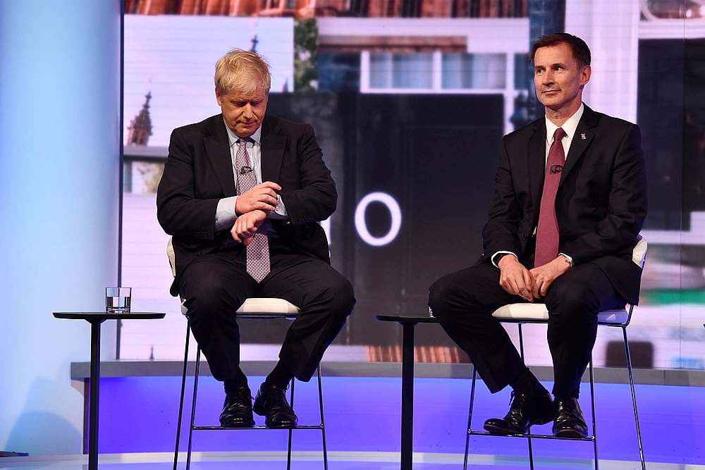 Boris Johnson and Jeremy Hunt appear on BBC TV's debate with candidates vying to replace British PM Theresa May, in London June 18, 2019. u00e2u20acu201d Jeff Overs/BBC handout via Reuters