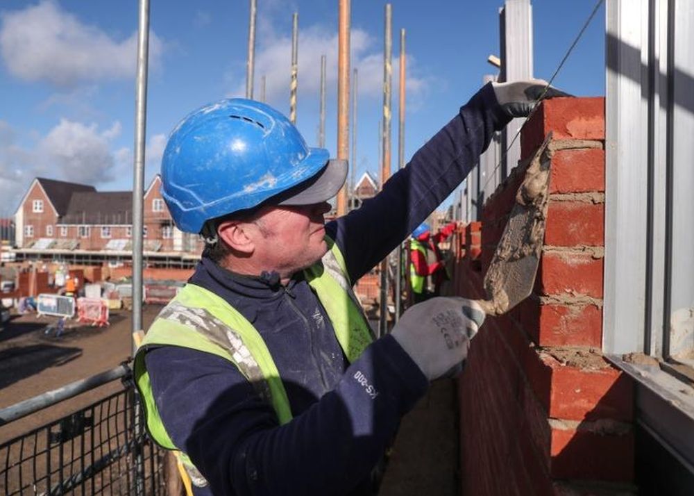 File picture shows a bricklayer working for Taylor Wimpey building a wall on an estate in Aylesbury, Britain February 7, 2017. u00e2u20acu201d Reuters pic