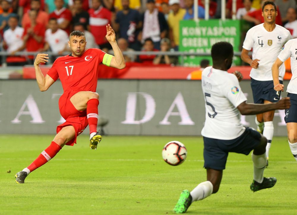 Turkey's Burak Yilmaz shoots at goal in the match against France. u00e2u20acu201d Reuters pic 