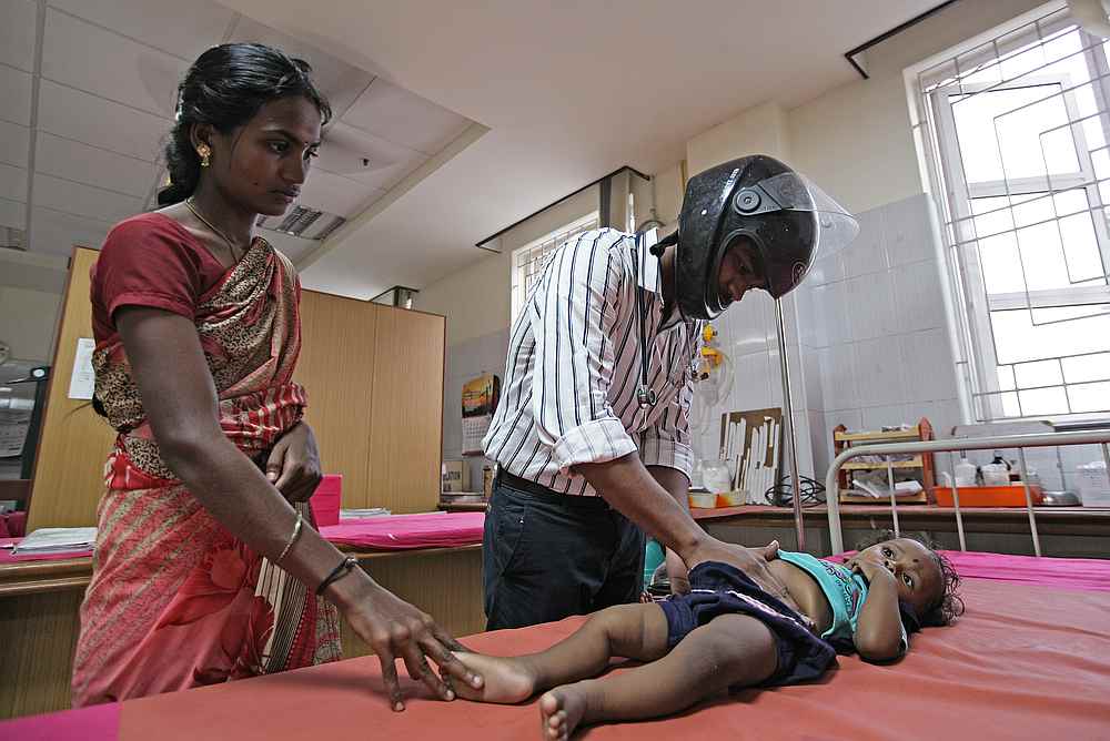 A doctor wearing a helmet examines a patient inside a ward during a nationwide doctors strike demanding security after the recent assaults on them by the patients' relatives, in Chennai, India June 17, 2019 u00e2u20acu201d Reuters pic