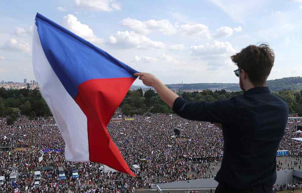 nA demonstrator waves a Czech Republic flag during a protest rally demanding resignation of Czech Prime Minister Andrej Babis in Prague, Czech Republic June 23, 2019. u00e2u20acu201d Reuters pic