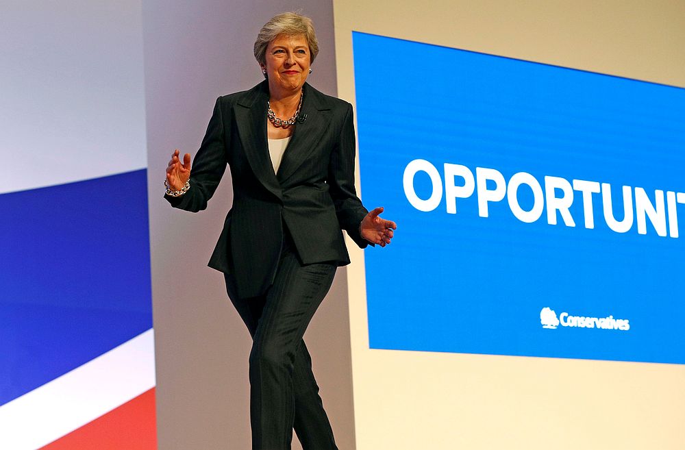 British Prime Minister Theresa May arrives on stage dancing to Abba's 'Dancing Queen' before delivering her keynote address on the final day of at the Conservative Party Conference in Birmingham October 3, 2018. u00e2u20acu201d Reuters pic 