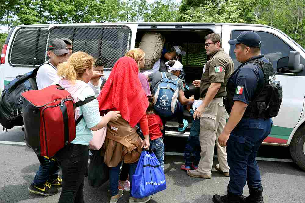 Migrants board a van of the National Migration Institute after being detained by the Mexican government to stop a caravan of Central American migrants on their way to the US, at Metapa de Dominguez in Chiapas, Mexico June 5, 2019. u00e2u20acu201d Reuters pic