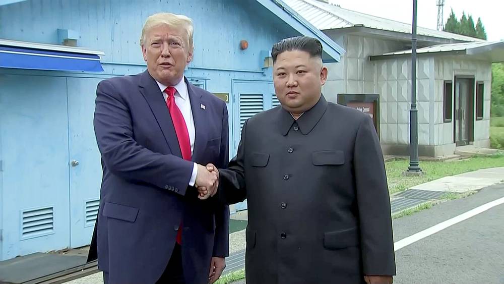 US President Donald Trump meets North Korean leader Kim Jong-un at the demilitarised zone (DMZ) separating the two Koreas, in Panmunjom, South Korea, June 30, 2019. u00e2u20acu201d US Network Pool video image via Reuters
