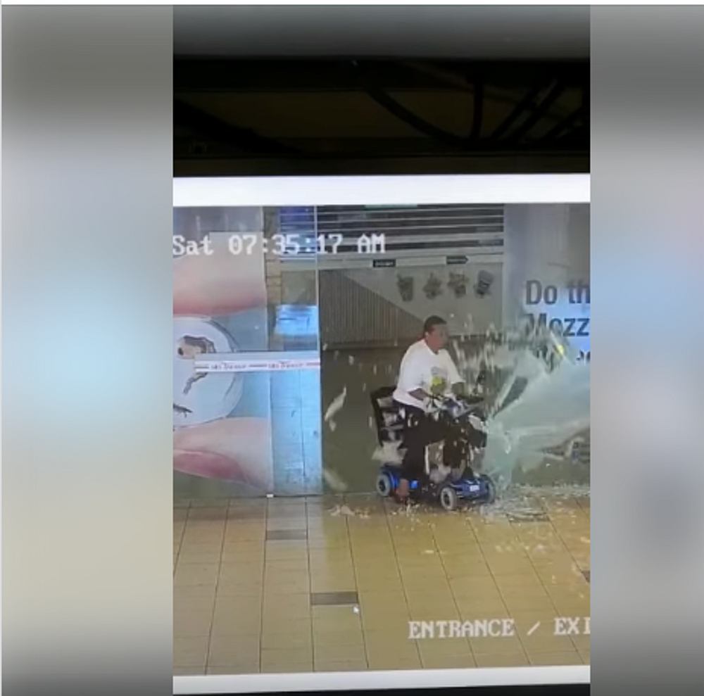 A video posted to Facebook by bus operator with SBS Transit June 1, 2019 shows a woman on a mobility scooter riding into a sliding door and smashing it into pieces. u00e2u20acu201d Image from Facebook/SBS Transit via TODAYn