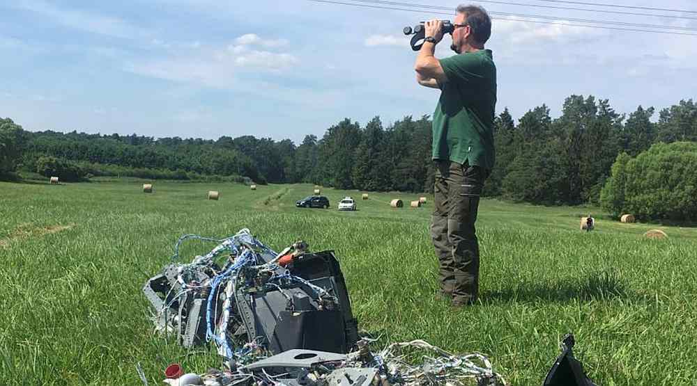 A forest official stands next to debris after two Eurofighter warplanes crashed after a mid-air collision near the village of Jabel in northeastern Germany June 24, 2019. u00e2u20acu201d Reuters pic