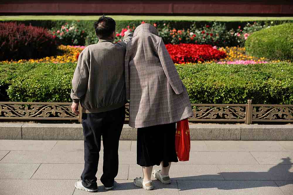 People look at a flower arrangement at Tiananmen Square in Beijing, China May 7, 2019. u00e2u20acu201d Reuters pic
