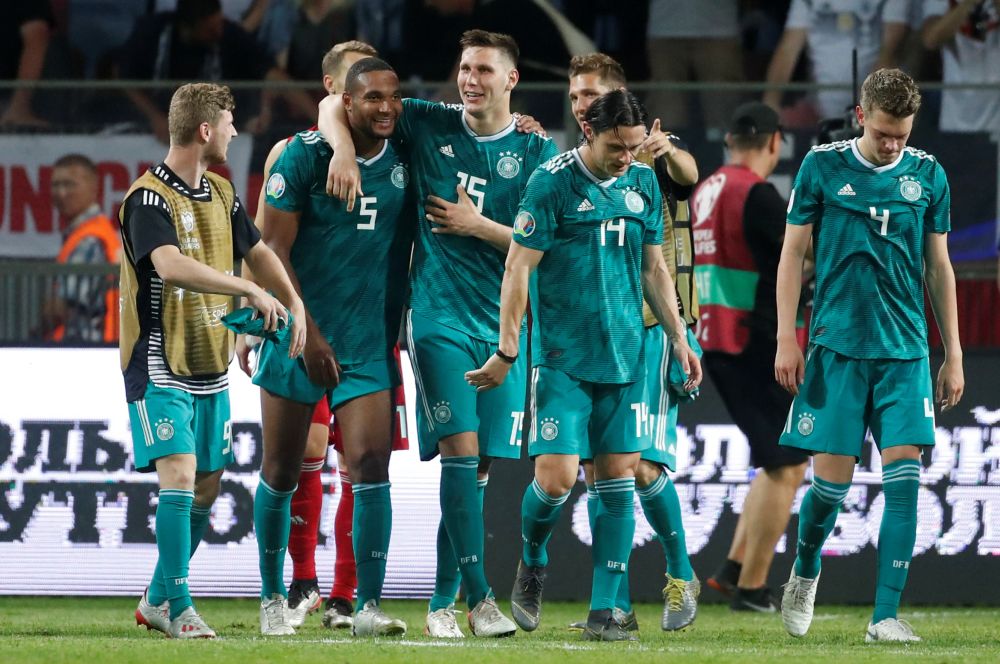 Germany's Jonathan Tah (5), Niklas Sule (15) and team mates celebrate after the match against Belarus. u00e2u20acu201d Reuters pic 
