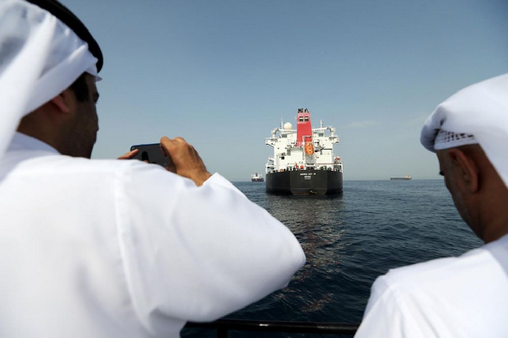 File picture shows port officials taking a photo of the damaged tanker Andrea Victory at the Port of Fujairah, United Arab Emirates, May 13, 2019. u00e2u20acu201d Reuters pic