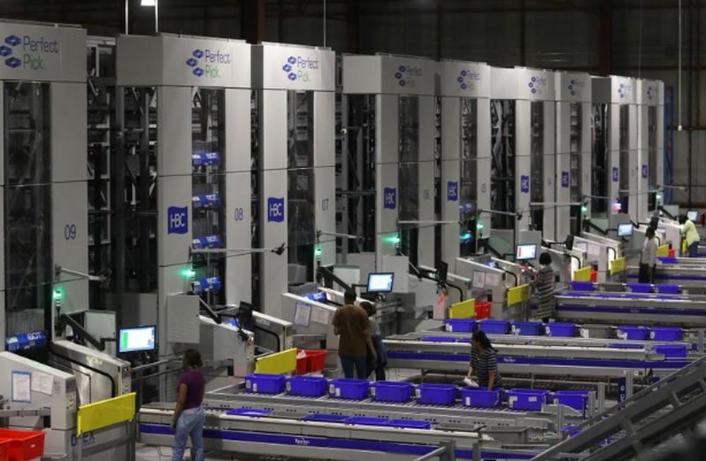 Workers on automated systems at the Hudsonu00e2u20acu2122s Bay Company distribution centre in Toronto, Ontario, Canada May 29, 2017. u00e2u20acu201d Reuters pic