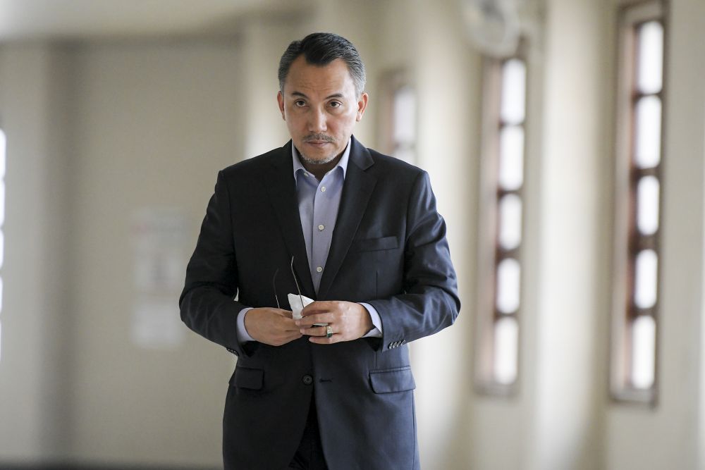 Ex-SRC International director Tan Sri Ismee Ismail arrives at the Kuala Lumpur Court Complex June 12, 2019. — Picture by Firdaus Latif