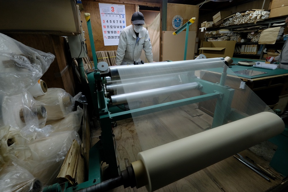 This picture taken on March 15, 2019 shows a worker checking a roll of the worldu00e2u20acu2122s thinnest u00e2u20acu02dcwashiu00e2u20acu2122 paper at the Hidaka Washi factory in Hidaka, Kochi prefecture, some 640 kilometres southwest of Tokyo. u00e2u20acu201d AFP pic       
