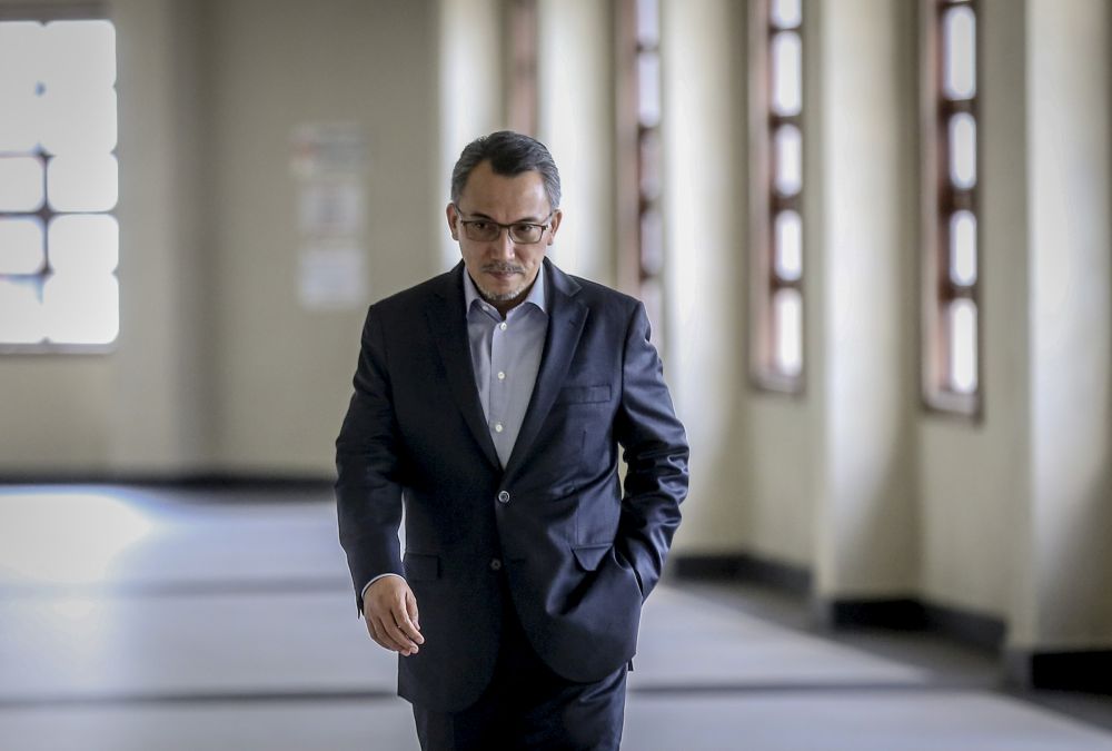 Ex-SRC International director Tan Sri Ismee Ismail is pictured at the Kuala Lumpur Court Complex June 14,2019. u00e2u20acu201d Picture by Firdaus Latif