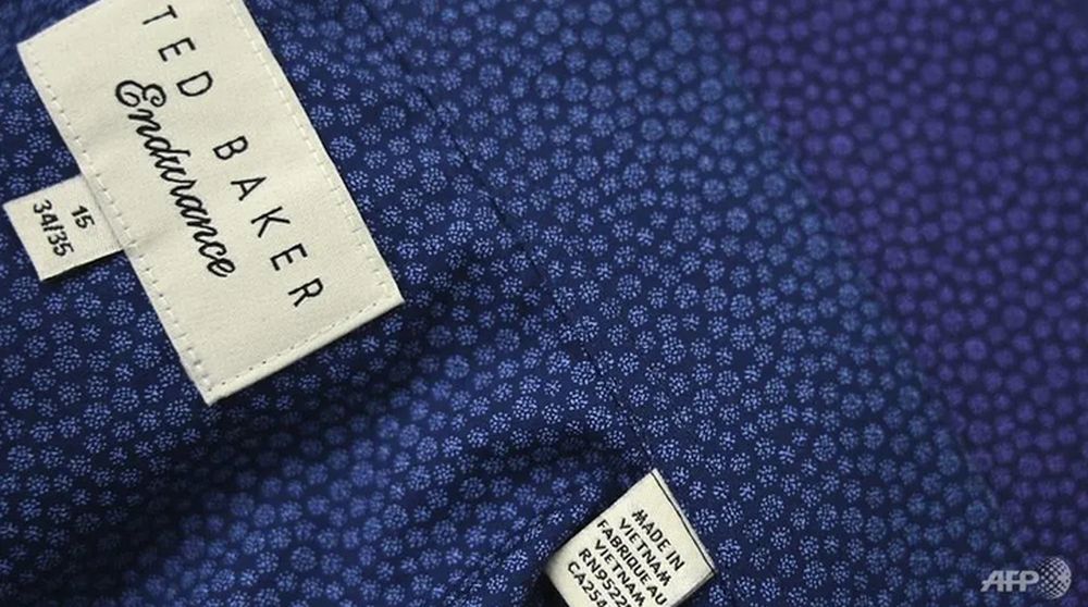 Photograph taken on May 24, 2019 shows a Ted Baker brand men's shirt labelled u00e2u20acu02dcMade in Vietnamu00e2u20acu2122 in a factory in Hanoi. u00e2u20acu201d AFP pic
