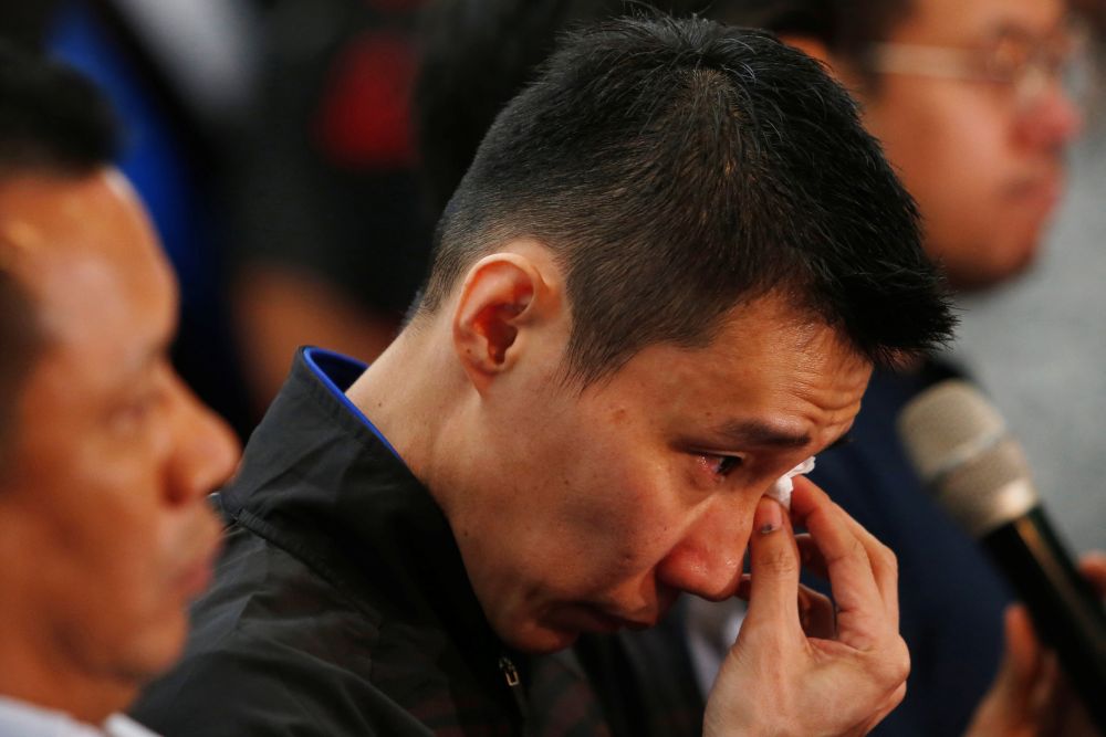 Datuk Lee Chong Wei wipes away tears during a news conference to announce his retirement in Putrajaya June 13, 2019. u00e2u20acu201d Reuters